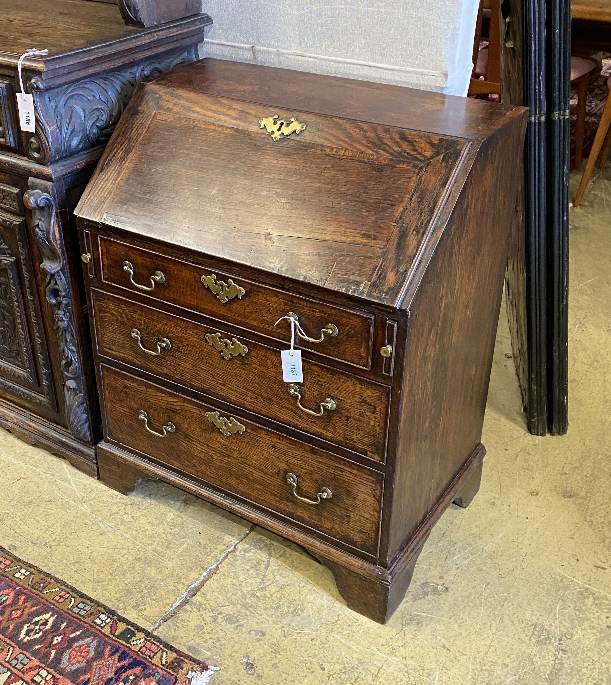 A small George III oak bureau, width 72cm, depth 47cm, height 88cm